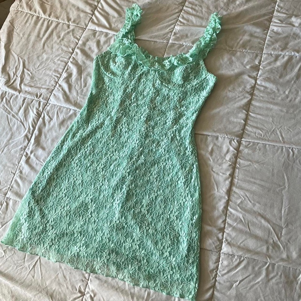 Teal green dress with floral lace detailing